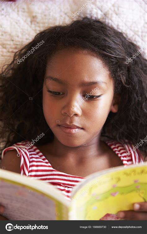 Girl Reading Book Stock Photo By ©monkeybusiness 166669730