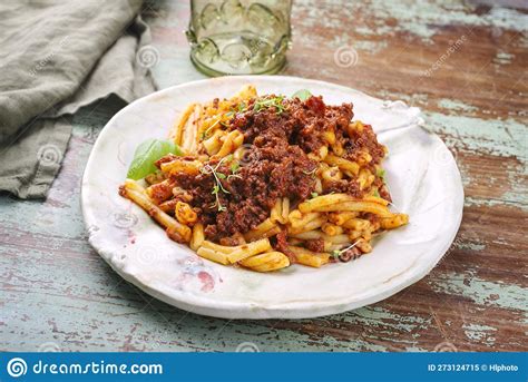 Traditional Casarecce Al Bronzo Al Rag Italian Pasta With Minced Meat Tomato Ragu Sauce On A