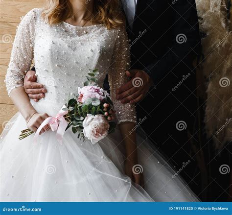 Young Slender Bride In A Long White Elegant Wedding Dress Honeymoon