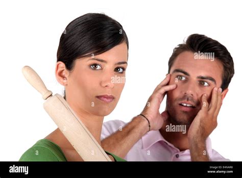Woman Hitting Man With Rolling Pin Hi Res Stock Photography And Images Alamy