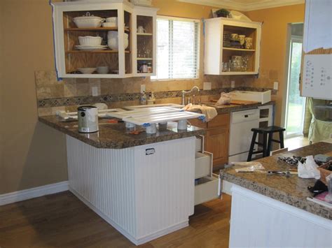 Without the time, cost, and labor needed to completely rebuild the cabinets, refacing is an ideal choice for your kitchen remodel. BIG TIME House Lover...: UGLY Oak Kitchen Cabinet ...