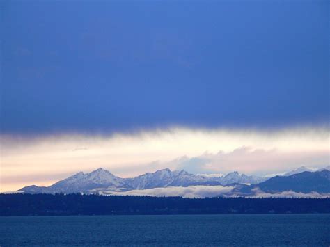 Olympic Mountain Range With Puget Sound Seattle Wa A Photo On