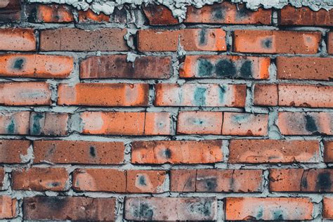 Brown Brick Wall Close Up Photography · Free Stock Photo