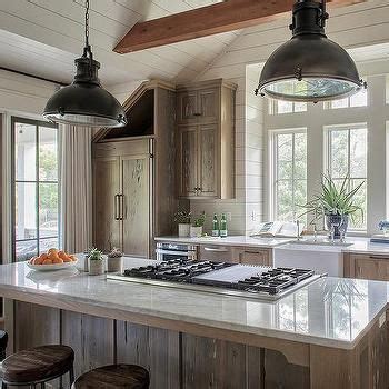 The second one is made for an ice maker or small refrigerator. Country Kitchen with Pecky Cypress Cabinets and Island ...