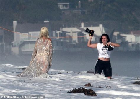 lady gaga bares her braless assets on very risqué beach shoot daily mail online