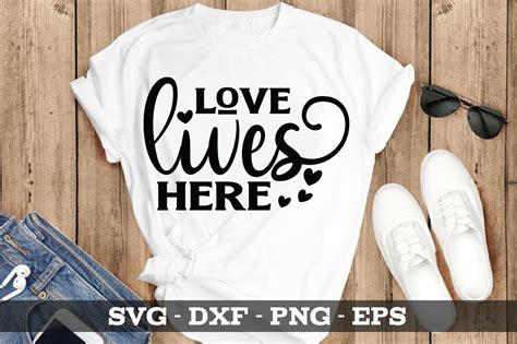 Love Lives Here SVG Graphic by Designartstore · Creative Fabrica