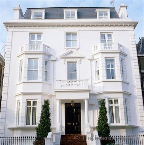 Maybe you would like to learn more about one of these? A classic double-fronted stucco facade representative of ...
