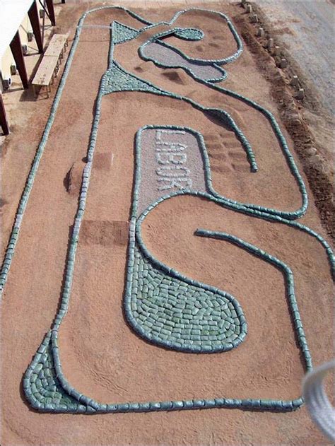 Follow these guidelines to build your own diy pump track, a circuit of banked turns and rollers that can feel like a perpetual motion machine. Make a DIY outdoor race car track for your kids! | DIY ...