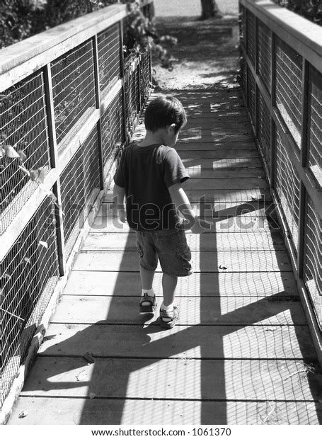 Boy Walking Down Path Stock Photo 1061370 Shutterstock