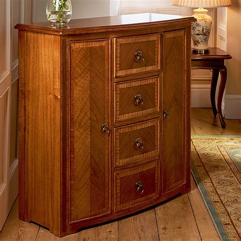 Expertly crafted with dovetail joints on drawers. Buy Pippy Oak Veneer Sideboard from Museum Selection.