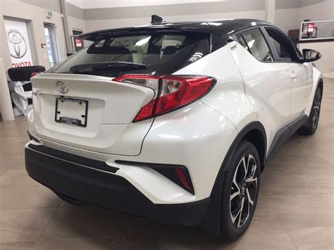 White pearl with black roof. New 2019 Toyota C-HR XLE Premium 4 Door Sport Utility in ...