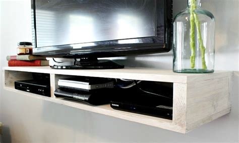 Mid century style of entertainment center. How to Build a Floating TV Shelf - Pretty Handy Girl