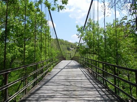 The completion of the greers ferry dam in the 1960s created this huge water playground. Swinging Bridges | Referred to as either "the twin bridges ...