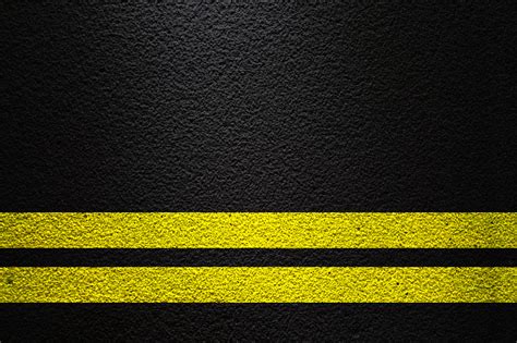Double yellow line may be standardized or custom made. Double Yellow Line Stock Photo - Download Image Now - iStock