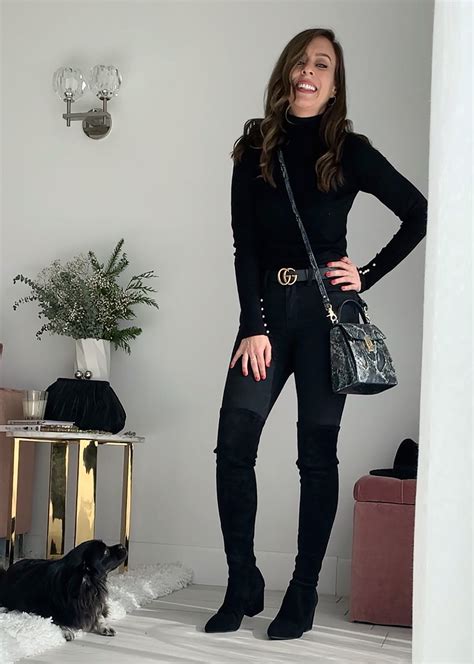 sydne style shows how to wear over the knee boots with black jeans and turtleneck for classic