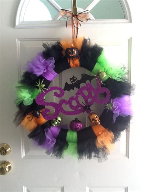 Homemade pool noodle halloween decorations supplies for pool noodle halloween crafts. Halloween wreath. Pool noodle, lots of tulle and some ...