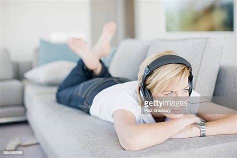 Barefoot Woman With Headphones Photos And Premium High Res Pictures Getty Images