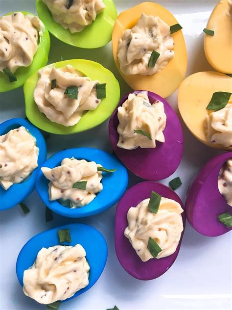 I frequently find myself looking for recipes that use a lot of eggs. Colored Deviled Eggs - Three Olives Branch