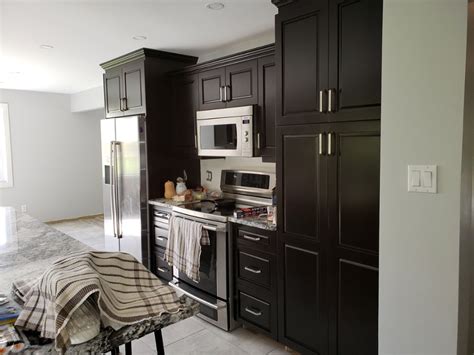 Advertisement step 1 remove the hardware from your kitchen cabinets with a screwdriver. Why You Should Refinish Your Cabinets Instead of Replacing ...