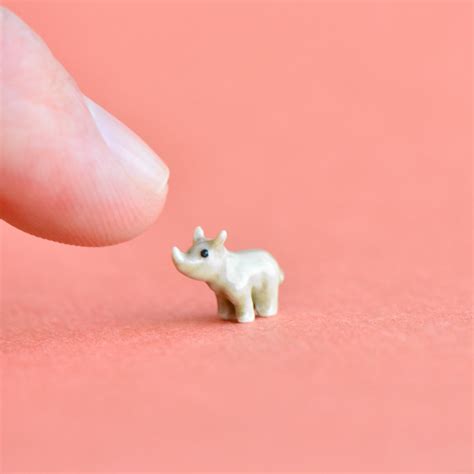 Worlds Tiniest Rhinoceros Porcelain Figurine Camp Hollow