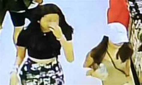 singapore girls caught shoplifting in bangkok slammed for smiling in mugshots singapore news