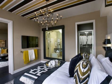 The designer has been inspired from the bedrooms of the royal families to create this design where the magnificent chandelier and the mirror are a perfect this design proposes the idea of having two wood colors that can integrate in the best way possible and to be the perfect base on which to build a. Multifunctional Master Bedrooms | HGTV