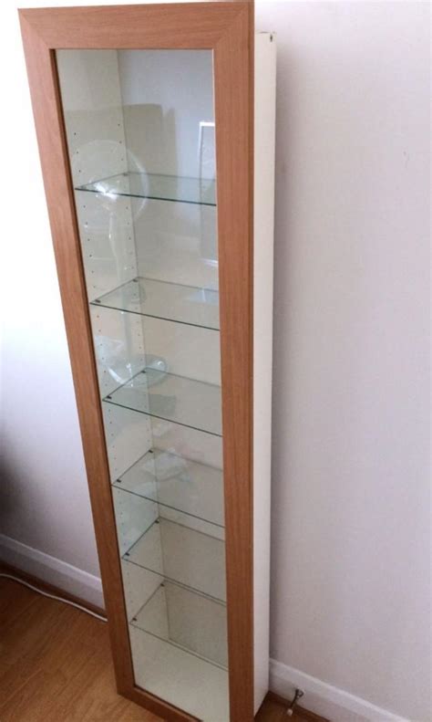 170cm tall 42.5cm wide 19cm deep adjustable glass shelves i had two of these to display my collection. Bertby Display Cabinet | Cabinets Matttroy