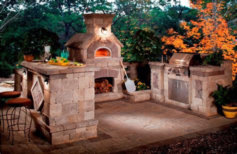 An outdoor kitchen brings the heart of the home into the open air and extends a home's living space. Rustic-Outdoor-Kitchen-Designs-with-Pizza-Oven - DIYbunker