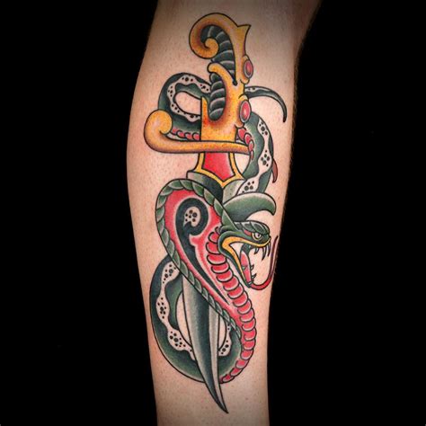 Snake tattoos have have been a stable motif in the tattoo industry ever. Traditional Cobra Tattoo by Tony Medellin | Tradicional