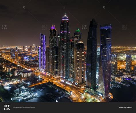 Aerial View Of Illuminated Skyscrapers At Night In Dubai United Arab