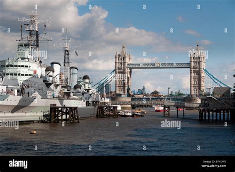 Hms Belfast And The Tower Bridge On The River Thames In London England