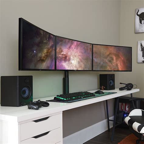 It has a lot of space for your computer or computers and more. ECHOGEAR Triple Monitor Desk Mount Stand for 3 Screens Up ...