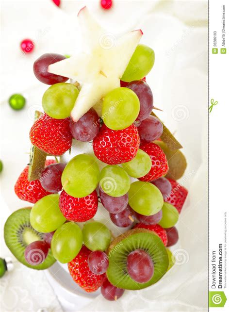 Better than gift baskets and fruit baskets these floral creations are a peg up on gift baskets. Edible Fruit Christmas Tree Stock Image - Image of food ...