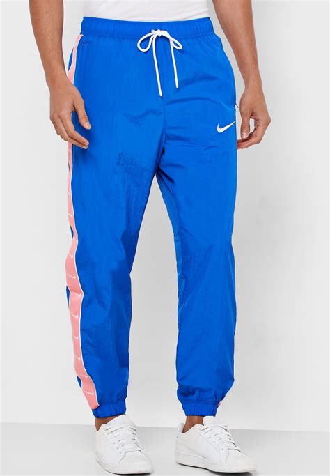 Buy Nike Blue Swoosh Sweatpants For Men In Mena Worldwide