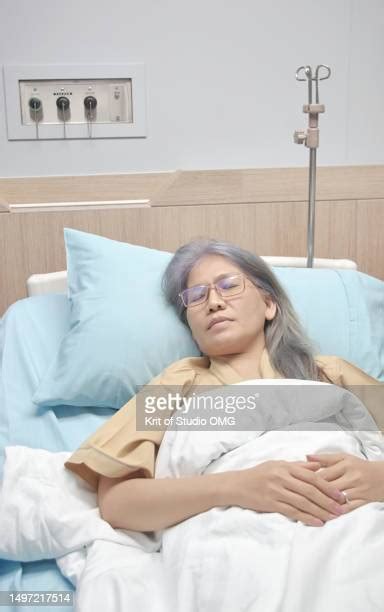 Mature Woman Lying In Hospital Bed Photos And Premium High Res Pictures Getty Images