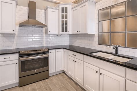 Cambria white cliff quartz kitchen counter and quartzite kitchen island. Quartz Countertops Cleveland Akron Medina | Lumberjack's ...