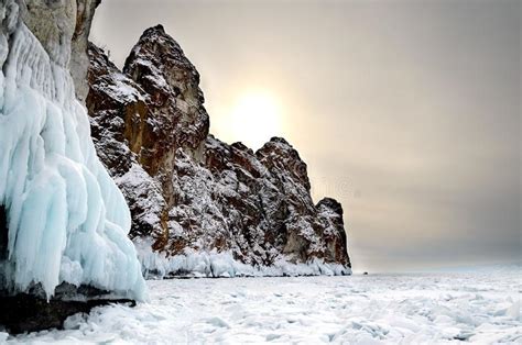 Sunset Ice Splashes On Frozen Rocks Of West Coast Of Olkhon Island And