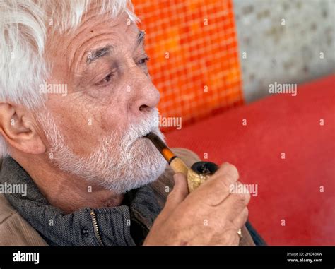 Man Smoking A Pipe Stock Photo Alamy