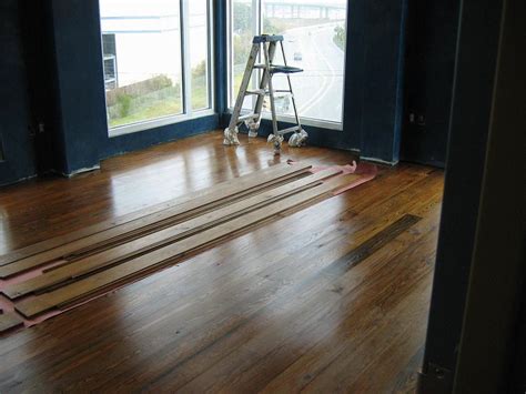 We install a hardwood floor on concrete using the direct stick method. Can I Install Wood Flooring Over Concrete?