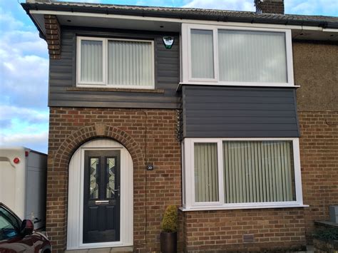 Anthracite Grey Cladding And Composite Door Modernisation Of 70s Home