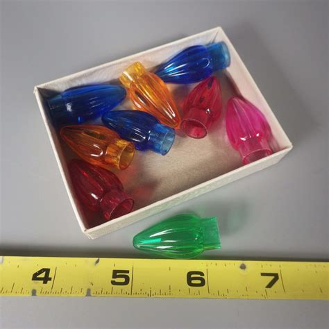 Lighting is one of the most important of all building systems, and we offer buyers thousands products the range of lights manufacturers,wholesalers we represented is extensive. Vintage Christmas Tree Plastic Light Bulb Covers Set of 9