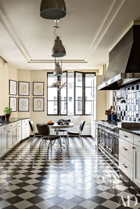 The Black And White Checkered Floor Brings Drama To This Paris Kitchen
