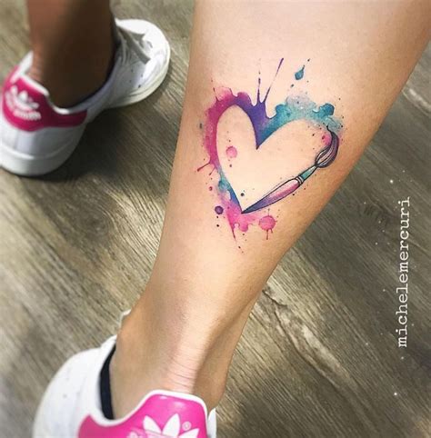 A Person With A Heart Tattoo On Their Leg