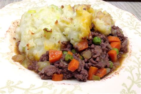 Shepherd's pie is made with lamb or mutton, either already cooked or not, with some flavouring vegetables such as onion mixed in, then topped with mashed potato and baked. cottage pie origin