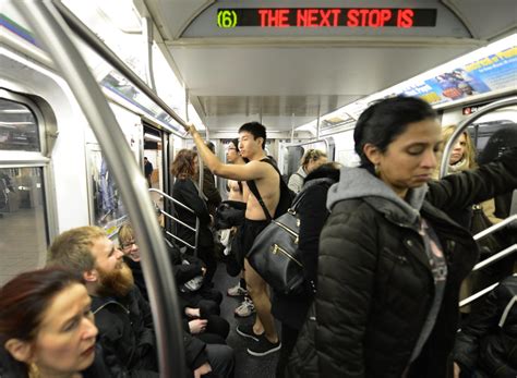 Riders Strip On Nyc Subways