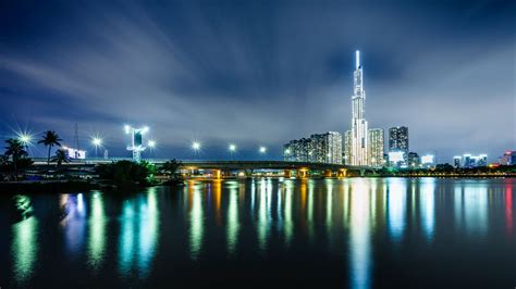 Download Wallpaper 1366x768 Night City Buildings Architecture River