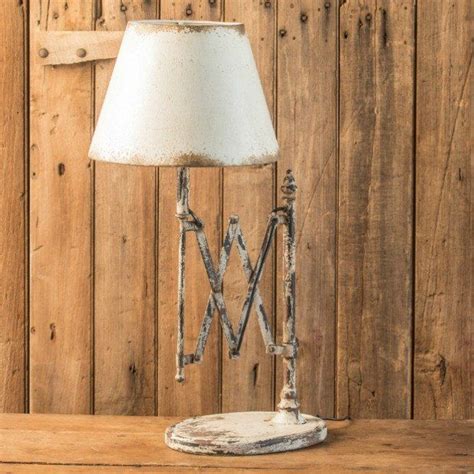 Light and airy describes this white wonderland farmhouse bedroom. Rusty White Expandable Table Lamp | Farmhouse table lamps ...