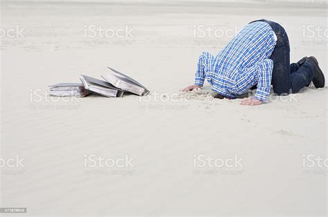 Office Worker Hiding Head In Sand Stock Photo Download Image Now Istock