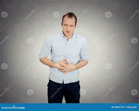 Man Doubling Over In Acute Body Stomach Pain Stock Image Image Of