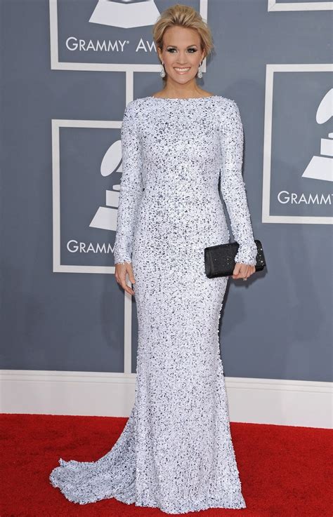 Carrie underwood won season 4 of 'american idol' in 2005 and went on to become one of the carrie underwood was inducted into the grand ole opry in 2008 at the age of 26, becoming the. Carrie Underwood Hot Images Bikini Pictures Sexy Photos